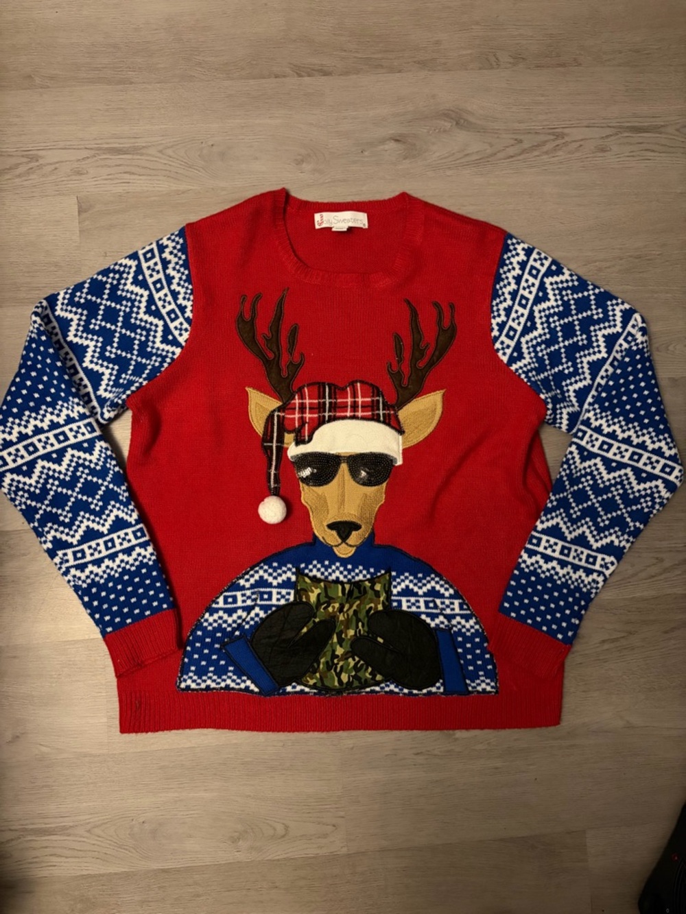 Red Reindeer Graphic Crewneck Sweater with Blue Fair Isle Sleeves